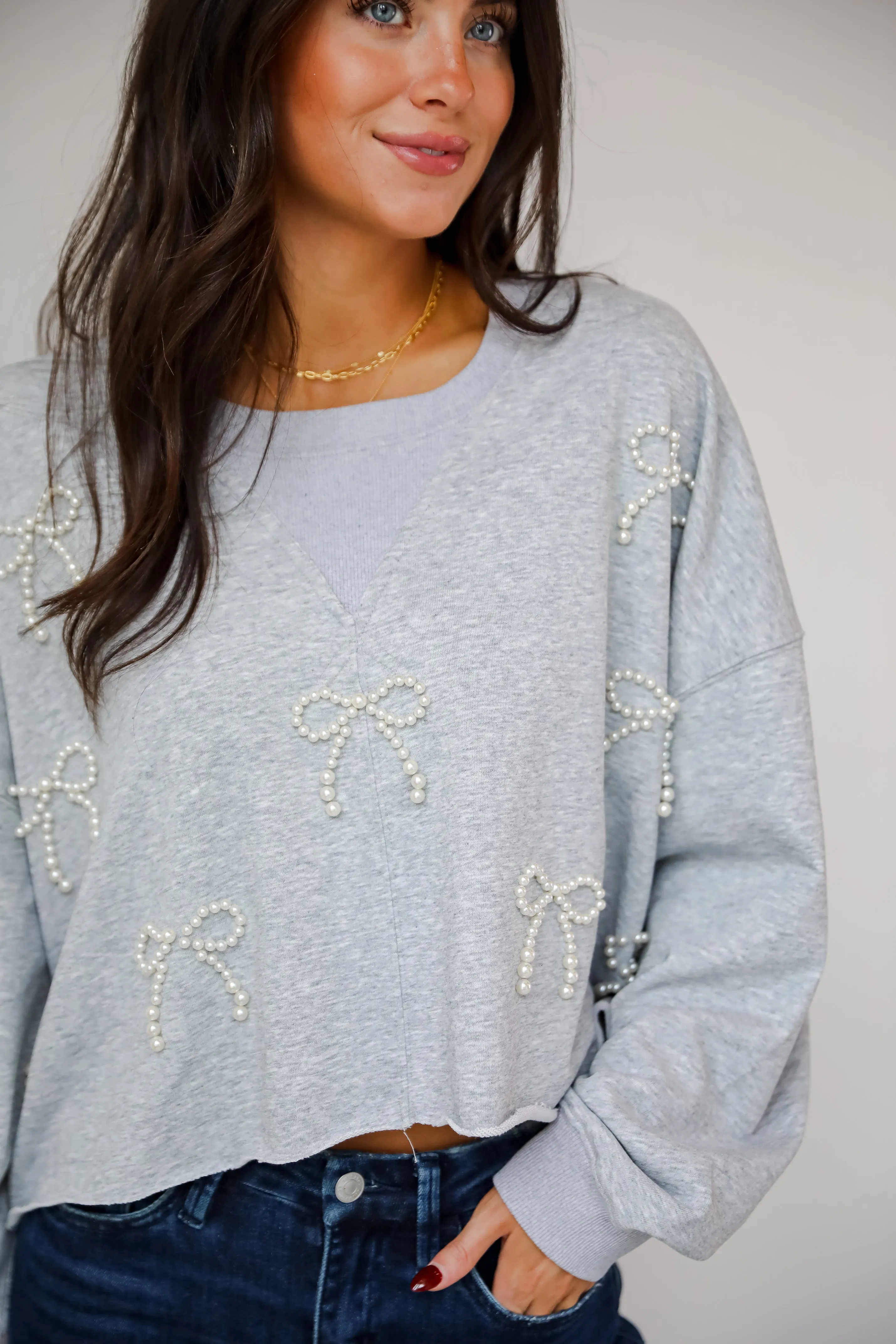 FINAL SALE - Dazzling Warmth Pearl Bow Cropped Pullover