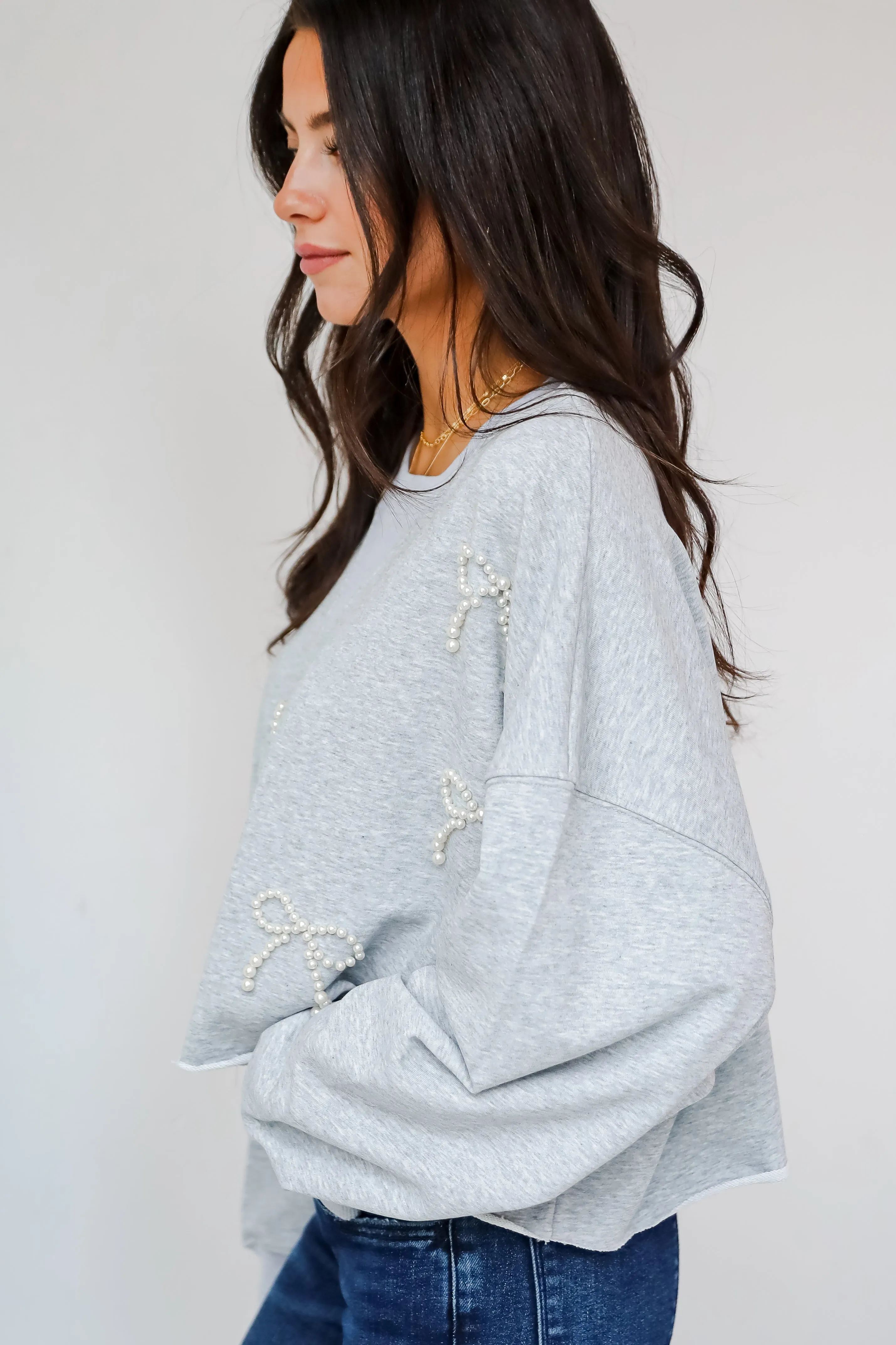 FINAL SALE - Dazzling Warmth Pearl Bow Cropped Pullover